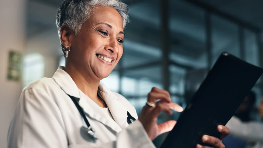 Healthcare worker reviewing report