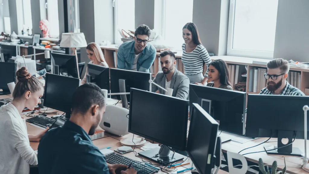 team working in office at computers